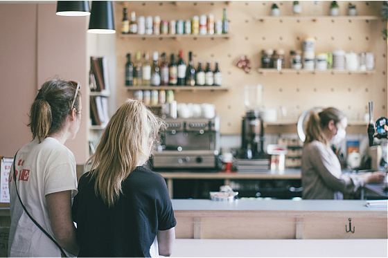 Women ordering at restaurant, COVID-19 times