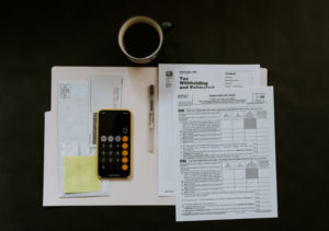 tax-prep materials, papers on desk