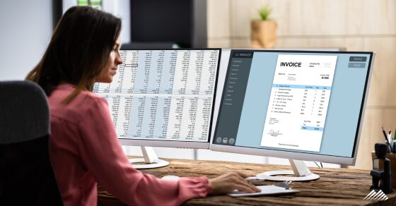 A woman looking at a computer screen