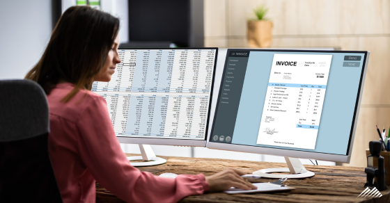 A woman looking at a computer screen