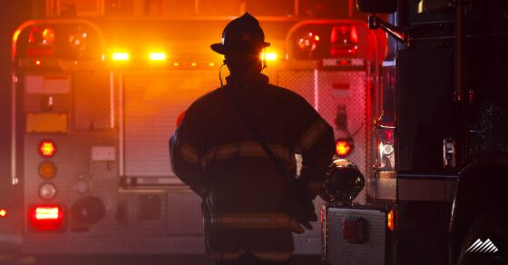 Firefighter near a firetruck