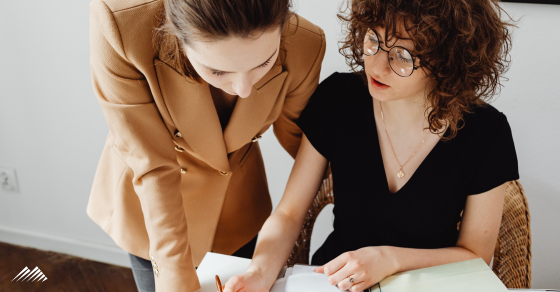 Two women going over paperwork