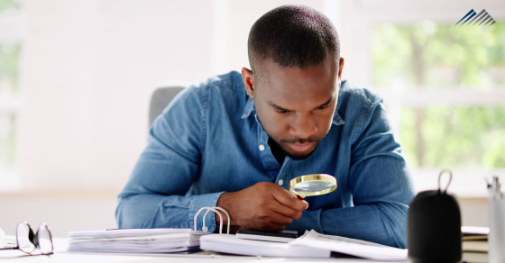 A taxpayer closely examining documents