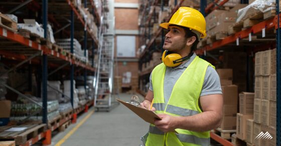 A worker taking inventory